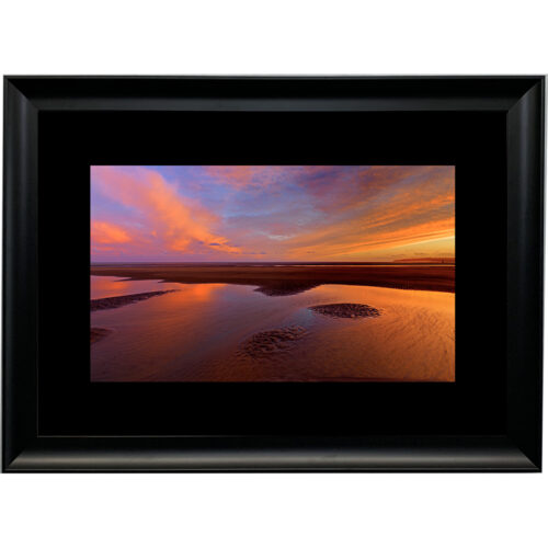 SUNSET ACROSS THE BEACH